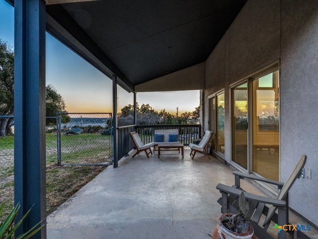 patio terrace at dusk with fence