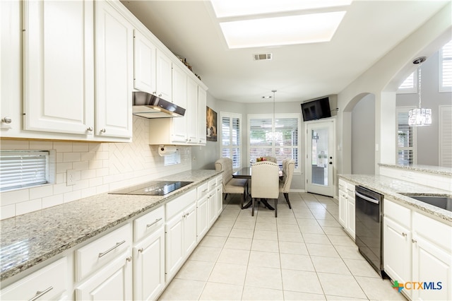 kitchen with black electric cooktop, stainless steel dishwasher, a notable chandelier, white cabinets, and pendant lighting