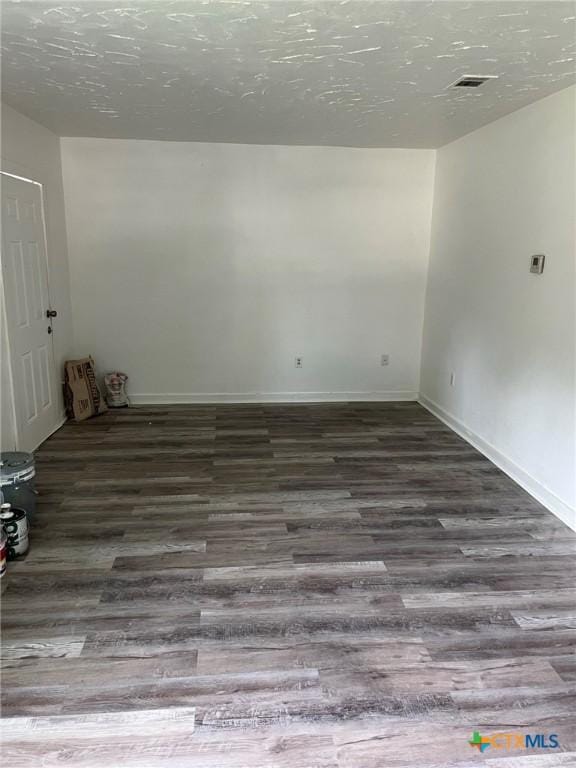 255 Pollard St, Beaumont, TX 77703 - spare room featuring wood finished floors and baseboards