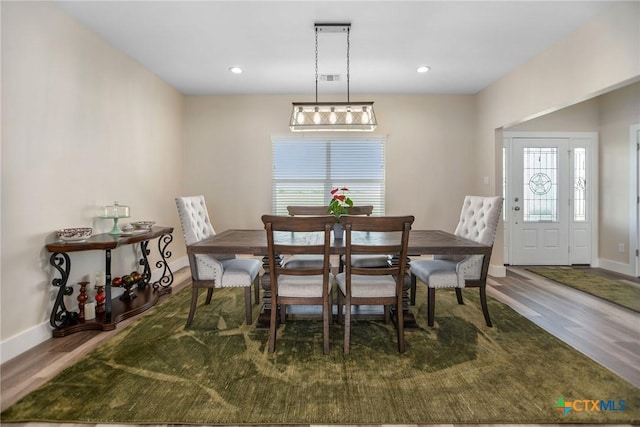105 N Redfish Retreat Dr, Port Lavaca, TX 77979 - dining space featuring wood finished floors, baseboards, and recessed lighting
