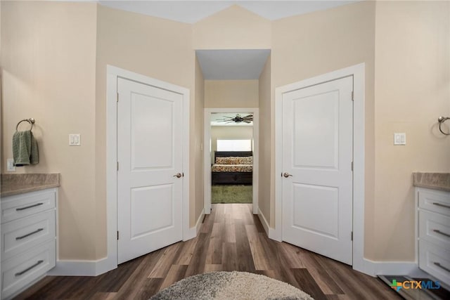105 N Redfish Retreat Dr, Port Lavaca, TX 77979 - bathroom featuring baseboards, wood finished floors, a ceiling fan, and vanity
