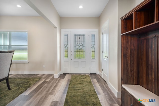 mudroom with hardwood / wood-style flooring