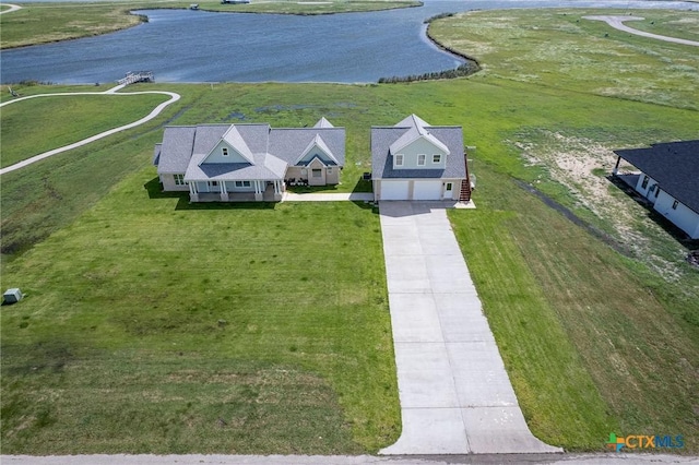 105 N Redfish Retreat Dr, Port Lavaca, TX 77979 - view from above of property with a nearby body of water