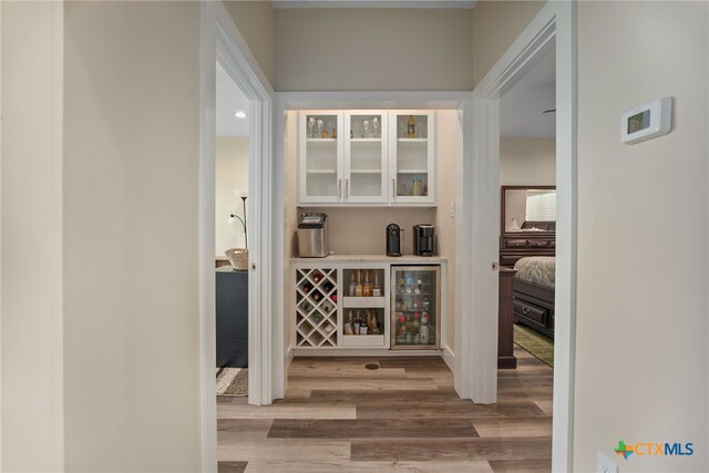 hallway with light wood-type flooring