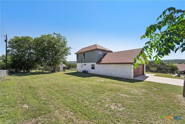 3400 Sally Cir, Kempner, TX 76539 - view of side of home with driveway, a garage, and central air condition unit