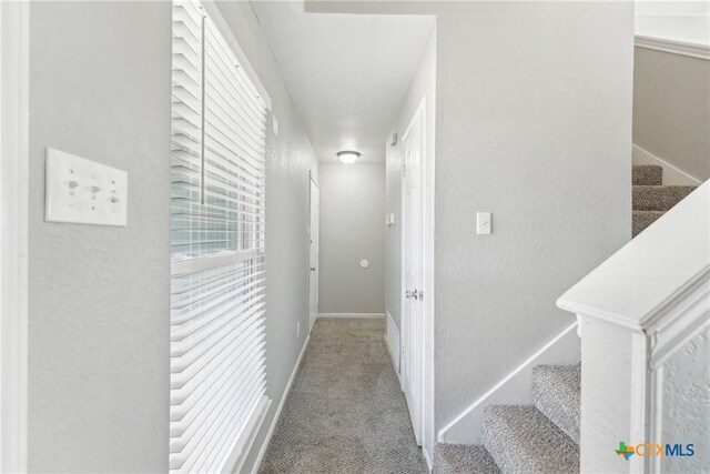 3400 Sally Cir, Kempner, TX 76539 - hall featuring stairway, carpet flooring, and a textured wall
