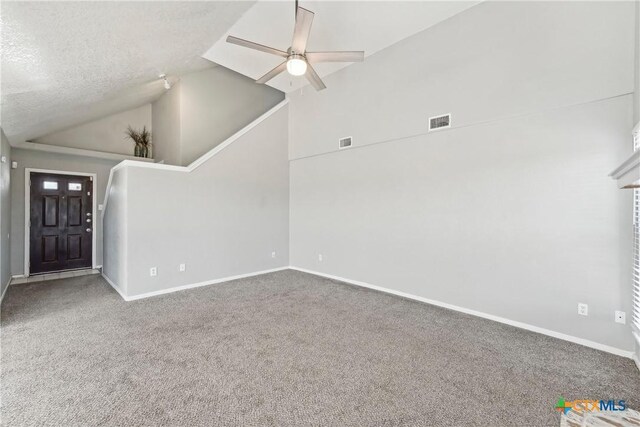3400 Sally Cir, Kempner, TX 76539 - foyer entrance with a ceiling fan, carpet flooring, baseboards, high vaulted ceiling, and a textured ceiling