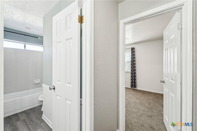 3400 Sally Cir, Kempner, TX 76539 - hallway with a textured ceiling