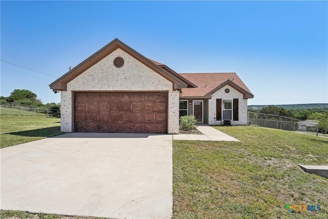 3400 Sally Cir, Kempner, TX 76539 - view of front of property featuring concrete driveway, an attached garage, and brick siding