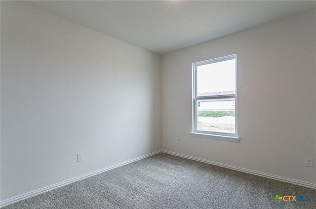 bathroom featuring hardwood / wood-style floors, toilet, and a shower with door