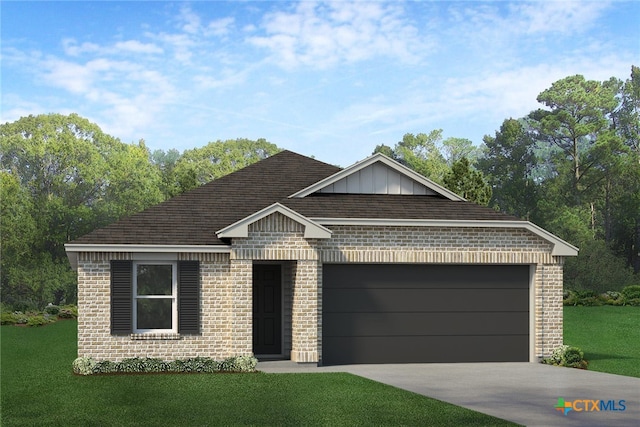 view of front of house featuring a front lawn and a garage