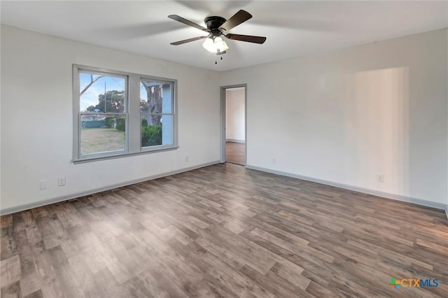 2901 Lone Tree Rd, Victoria, TX 77901 - empty room with wood finished floors and ceiling fan
