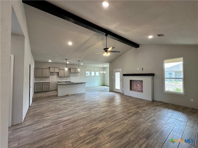 2591 Cedar Glen Dr, Belton, TX 76513 - unfurnished living room featuring wood finished floors, healthy amount of natural light, a ceiling fan, and recessed lighting