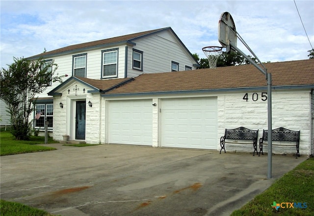 view of front of home featuring a garage