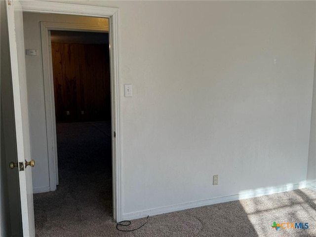 unfurnished room featuring carpet floors