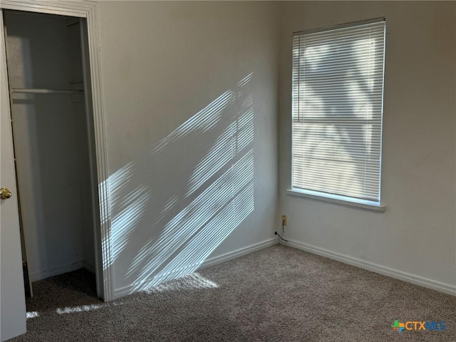 view of carpeted spare room