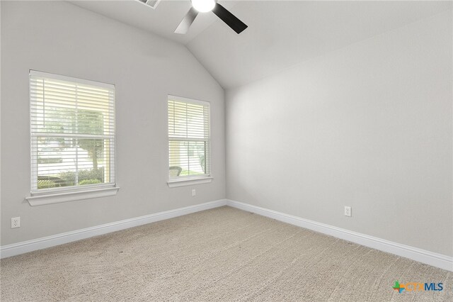232 Gaida Loop, Georgetown, TX 78628 - carpeted empty room with a ceiling fan, vaulted ceiling, and baseboards