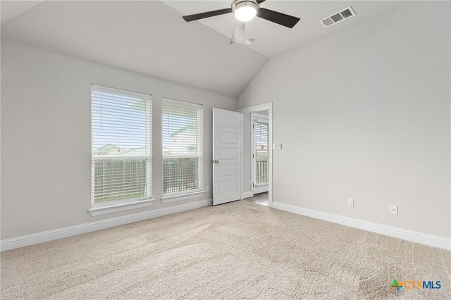 232 Gaida Loop, Georgetown, TX 78628 - unfurnished bedroom featuring carpet, vaulted ceiling, baseboards, and a ceiling fan