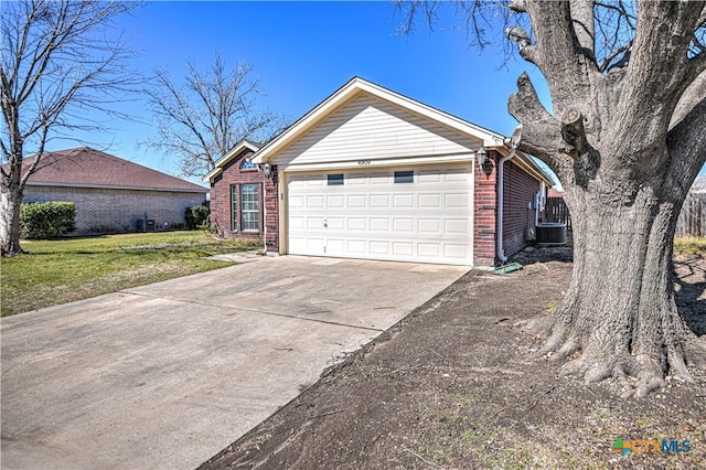 exterior space with driveway and central AC