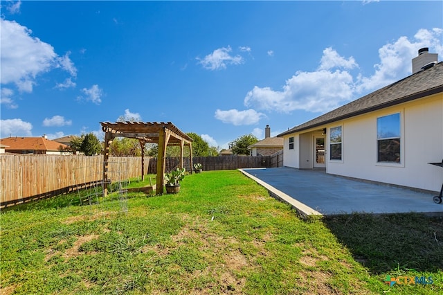 view of yard featuring a pergola and a patio area