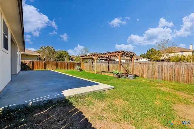 view of yard featuring a pergola and a patio