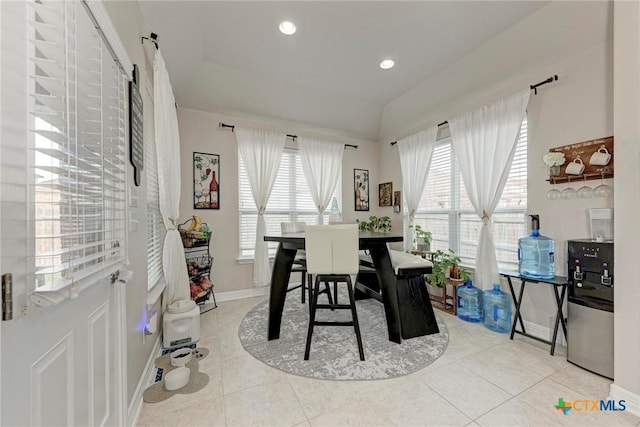 dining space featuring tile patterned floors