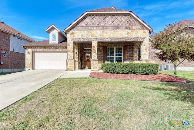 view of front of home featuring a front yard, a garage, and central AC unit