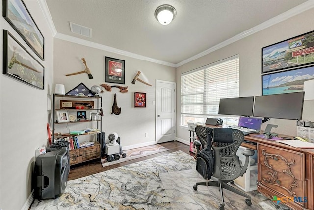 home office featuring hardwood / wood-style floors and ornamental molding