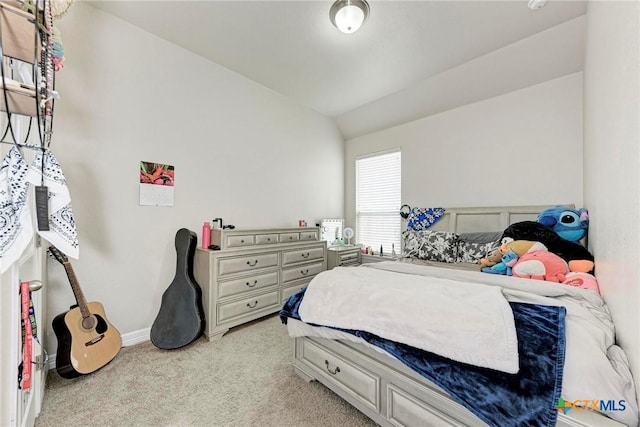 bedroom with light carpet and vaulted ceiling