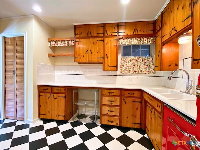 kitchen featuring sink and tasteful backsplash