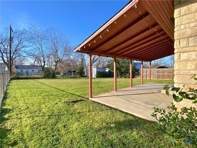 view of yard with a patio area