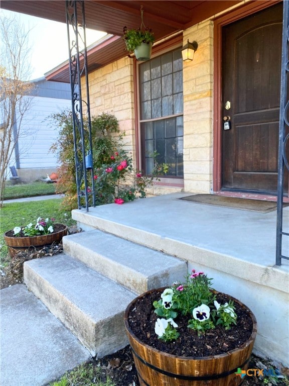 property entrance with a porch