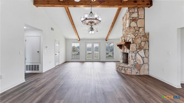 unfurnished living room with dark hardwood / wood-style flooring, ceiling fan with notable chandelier, beam ceiling, high vaulted ceiling, and a fireplace