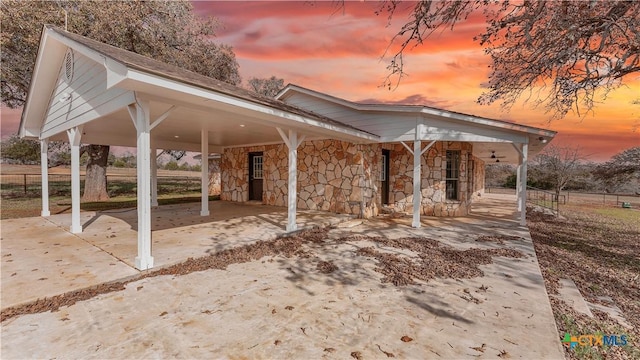 view of front of property with a carport