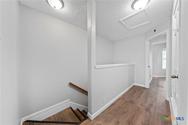 1311 Speight Ave, Waco, TX 76706 - hall with hardwood / wood-style flooring and a textured ceiling