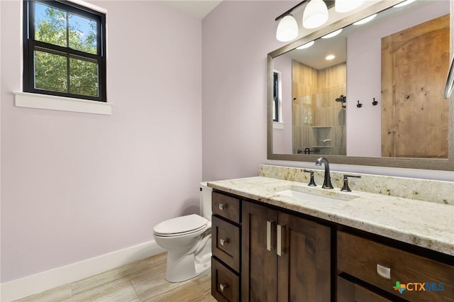 1204 Salt Lick Dr, New Braunfels, TX 78132 - full bath with vanity, a tile shower, and wood finished floors