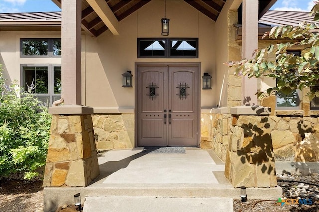 1204 Salt Lick Dr, New Braunfels, TX 78132 - view of exterior entry with stone siding and stucco siding
