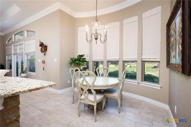 226 Sabella, Spring Branch, TX 78070 - dining area featuring crown molding, healthy amount of natural light, a chandelier, baseboards, and a high ceiling