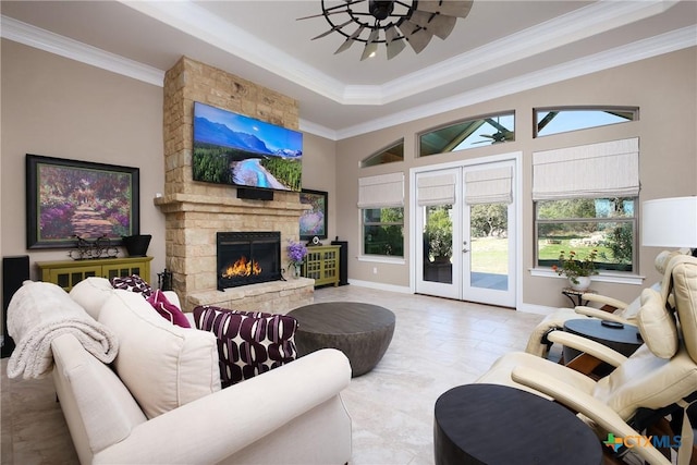 226 Sabella, Spring Branch, TX 78070 - living room with a fireplace, crown molding, a raised ceiling, a ceiling fan, and a high ceiling
