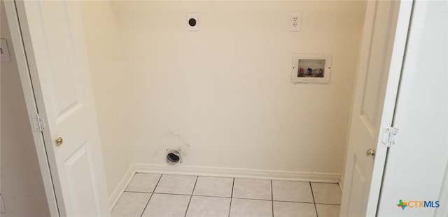 washroom with light tile patterned floors, hookup for a washing machine, and hookup for an electric dryer