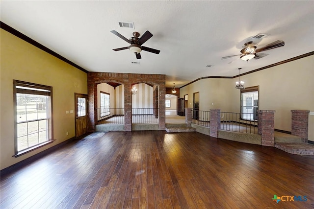 1260 Great Oaks Dr, Salado, TX 76571 - unfurnished living room featuring a ceiling fan, hardwood / wood-style floors, ornamental molding, plenty of natural light, and brick wall