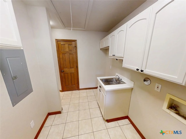 1260 Great Oaks Dr, Salado, TX 76571 - laundry area featuring electric panel, washer hookup, attic access, cabinet space, and light tile patterned flooring