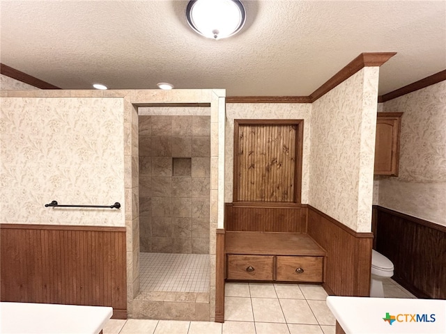 1260 Great Oaks Dr, Salado, TX 76571 - full bath with a wainscoted wall, a textured ceiling, a walk in shower, ornamental molding, and wood walls