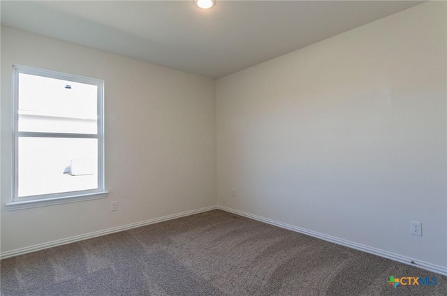1003 Antelope Trl, Temple, TX 76504 - carpeted spare room with baseboards