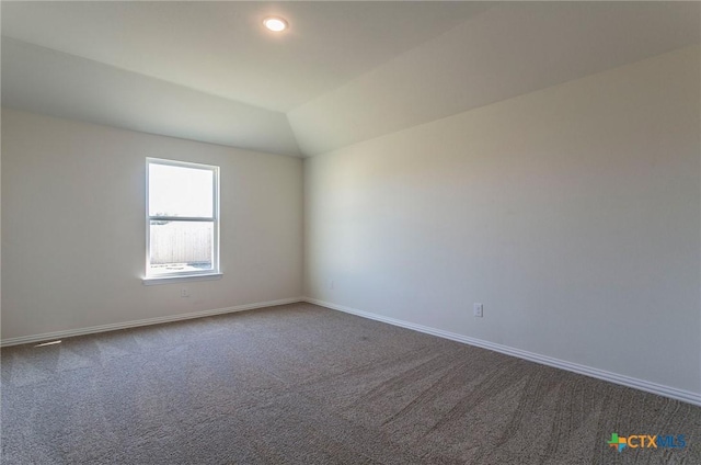 1003 Antelope Trl, Temple, TX 76504 - unfurnished room with baseboards, vaulted ceiling, and carpet flooring