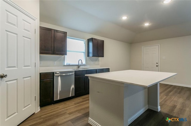 1003 Antelope Trl, Temple, TX 76504 - kitchen featuring a sink, dishwasher, dark brown cabinetry, light countertops, and dark wood-type flooring