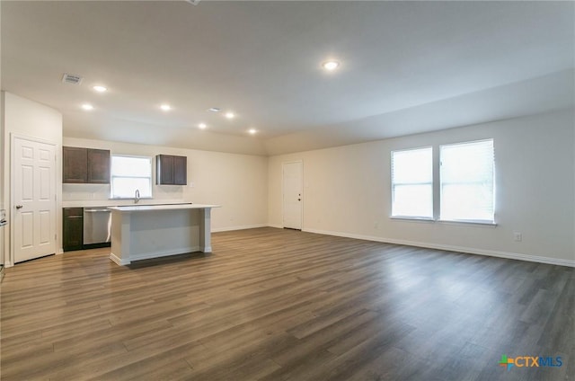 1003 Antelope Trl, Temple, TX 76504 - kitchen with dishwasher, a kitchen island, open floor plan, and dark wood-style floors