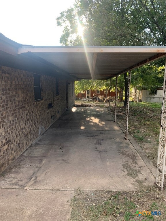 view of car parking featuring a carport