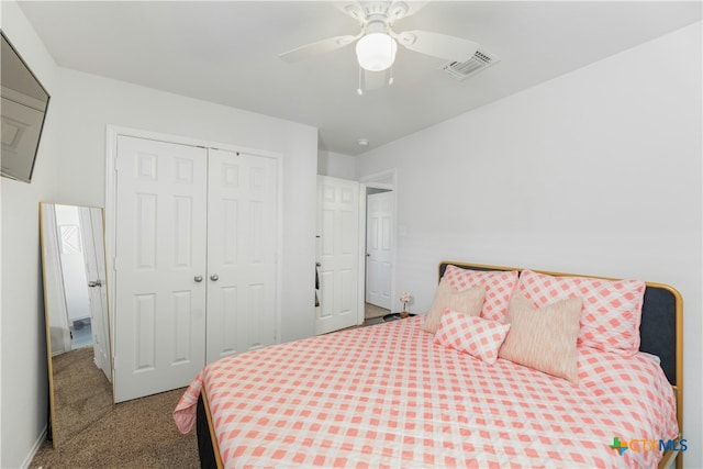 bedroom featuring ceiling fan, a closet, and carpet