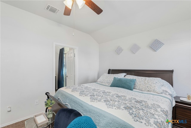 bedroom with carpet, vaulted ceiling, and ceiling fan